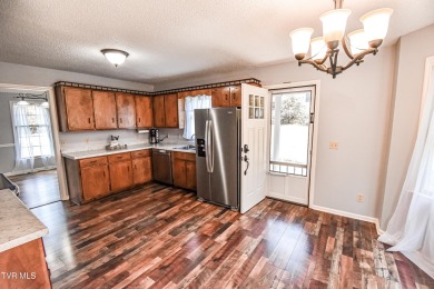 This gorgeous Cape Cod Colonial home is located in the heart of on Tri Cities Golf Club in Tennessee - for sale on GolfHomes.com, golf home, golf lot