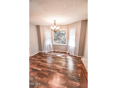 This gorgeous Cape Cod Colonial home is located in the heart of on Tri Cities Golf Club in Tennessee - for sale on GolfHomes.com, golf home, golf lot