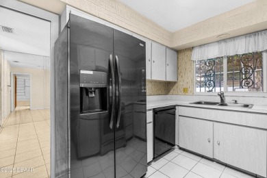 THIS HOUSE DID NOT FLOOD! This 3 bedroom, 2 bath, concrete block on Daytona Beach Golf Club in Florida - for sale on GolfHomes.com, golf home, golf lot