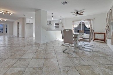 Under contract-accepting backup offers. Stunning Pool Home with on Rotonda Golf and Country Club The Hills Course in Florida - for sale on GolfHomes.com, golf home, golf lot