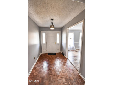 This gorgeous Cape Cod Colonial home is located in the heart of on Tri Cities Golf Club in Tennessee - for sale on GolfHomes.com, golf home, golf lot