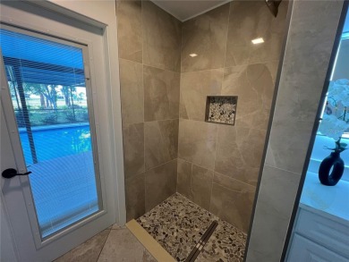 Under contract-accepting backup offers. Stunning Pool Home with on Rotonda Golf and Country Club The Hills Course in Florida - for sale on GolfHomes.com, golf home, golf lot