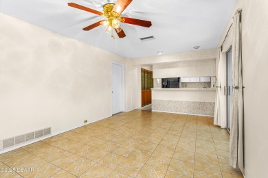 THIS HOUSE DID NOT FLOOD! This 3 bedroom, 2 bath, concrete block on Daytona Beach Golf Club in Florida - for sale on GolfHomes.com, golf home, golf lot