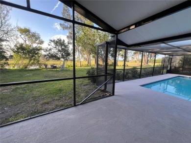 Under contract-accepting backup offers. Stunning Pool Home with on Rotonda Golf and Country Club The Hills Course in Florida - for sale on GolfHomes.com, golf home, golf lot