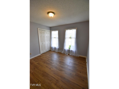 This gorgeous Cape Cod Colonial home is located in the heart of on Tri Cities Golf Club in Tennessee - for sale on GolfHomes.com, golf home, golf lot
