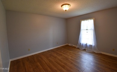This gorgeous Cape Cod Colonial home is located in the heart of on Tri Cities Golf Club in Tennessee - for sale on GolfHomes.com, golf home, golf lot
