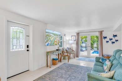 Fantastic 6 Bedroom, 4 Bath 3,248 sq. ft. waterfront pool home on Key Colony Beach Golf Course in Florida - for sale on GolfHomes.com, golf home, golf lot