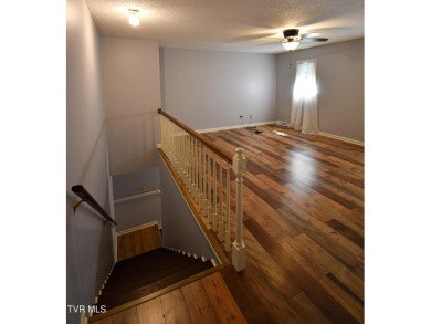 This gorgeous Cape Cod Colonial home is located in the heart of on Tri Cities Golf Club in Tennessee - for sale on GolfHomes.com, golf home, golf lot