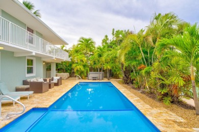 Fantastic 6 Bedroom, 4 Bath 3,248 sq. ft. waterfront pool home on Key Colony Beach Golf Course in Florida - for sale on GolfHomes.com, golf home, golf lot