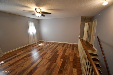 This gorgeous Cape Cod Colonial home is located in the heart of on Tri Cities Golf Club in Tennessee - for sale on GolfHomes.com, golf home, golf lot