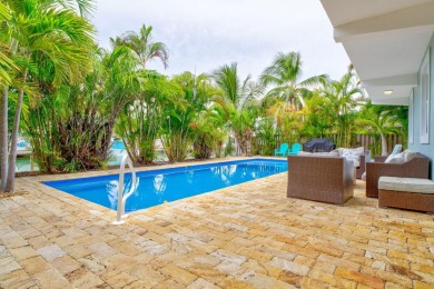 Fantastic 6 Bedroom, 4 Bath 3,248 sq. ft. waterfront pool home on Key Colony Beach Golf Course in Florida - for sale on GolfHomes.com, golf home, golf lot