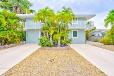 Fantastic 6 Bedroom, 4 Bath 3,248 sq. ft. waterfront pool home on Key Colony Beach Golf Course in Florida - for sale on GolfHomes.com, golf home, golf lot
