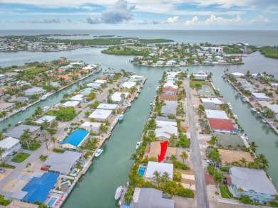 Fantastic 6 Bedroom, 4 Bath 3,248 sq. ft. waterfront pool home on Key Colony Beach Golf Course in Florida - for sale on GolfHomes.com, golf home, golf lot