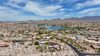 Nestled in the sought-after community of Estrella Mountain Ranch on Estrella Mountain Ranch Golf Course in Arizona - for sale on GolfHomes.com, golf home, golf lot