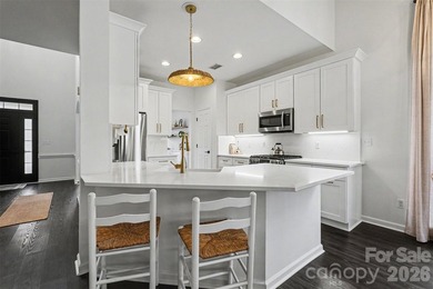 Set along the 4th tee of the golf course in the highly desirable on Highland Creek Golf Club in North Carolina - for sale on GolfHomes.com, golf home, golf lot