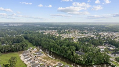 Looking for an affordable and low-maintenance property? Look no on Heron Point Golf Club in South Carolina - for sale on GolfHomes.com, golf home, golf lot