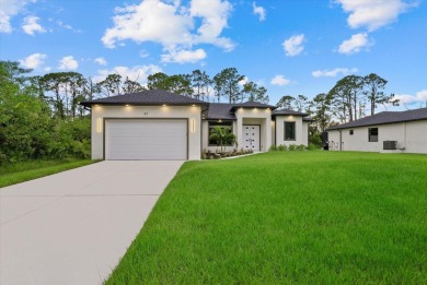 Welcome to your dream Florida oasis! This stunning newly built on Sabal Trace Golf and Country Club in Florida - for sale on GolfHomes.com, golf home, golf lot
