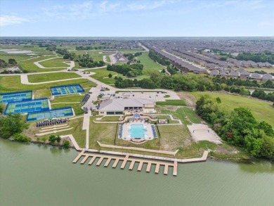 Former model home on a premium corner lot in the highly on Heath Golf and Yacht Club in Texas - for sale on GolfHomes.com, golf home, golf lot