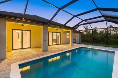 Welcome to your dream Florida oasis! This stunning newly built on Sabal Trace Golf and Country Club in Florida - for sale on GolfHomes.com, golf home, golf lot