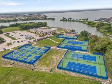 Former model home on a premium corner lot in the highly on Heath Golf and Yacht Club in Texas - for sale on GolfHomes.com, golf home, golf lot