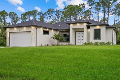 Welcome to your dream Florida oasis! This stunning newly built on Sabal Trace Golf and Country Club in Florida - for sale on GolfHomes.com, golf home, golf lot
