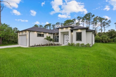 Welcome to your dream Florida oasis! This stunning newly built on Sabal Trace Golf and Country Club in Florida - for sale on GolfHomes.com, golf home, golf lot