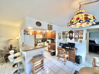 Discover the perfect blend of comfort and convenience in this on Kings Point Golf -Flanders Way in Florida - for sale on GolfHomes.com, golf home, golf lot