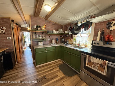 SNOWBIRDS AND HOME OWNERS WELCOME, Deeded Lot, NO LOT RENT on Glen Lakes Country Club in Florida - for sale on GolfHomes.com, golf home, golf lot