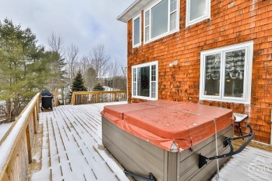 A warm abundance of natural light greets as you enter this on Windham Country Club in New York - for sale on GolfHomes.com, golf home, golf lot