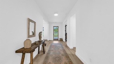 Completed in 2024, this 5 bedroom, 2 level waterfront home is on Sugar Tree Golf and Country Club in Texas - for sale on GolfHomes.com, golf home, golf lot