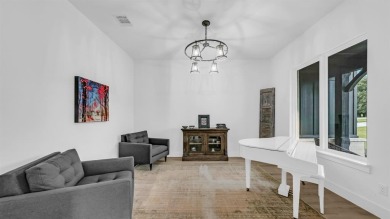 Completed in 2024, this 5 bedroom, 2 level waterfront home is on Sugar Tree Golf and Country Club in Texas - for sale on GolfHomes.com, golf home, golf lot