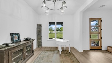 Completed in 2024, this 5 bedroom, 2 level waterfront home is on Sugar Tree Golf and Country Club in Texas - for sale on GolfHomes.com, golf home, golf lot