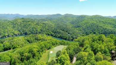 There are amazing views of layered mountains to the east and on Waterfall Country Club in Georgia - for sale on GolfHomes.com, golf home, golf lot