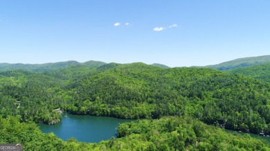 There are amazing views of layered mountains to the east and on Waterfall Country Club in Georgia - for sale on GolfHomes.com, golf home, golf lot