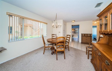 AFFORDABLE ~ 55+ MAINTENANCE FREE ~ TROPICAL SETTING ~ EXCELLENT on Gulf Harbors Golf Course in Florida - for sale on GolfHomes.com, golf home, golf lot