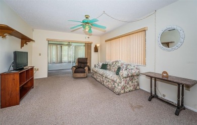 AFFORDABLE ~ 55+ MAINTENANCE FREE ~ TROPICAL SETTING ~ EXCELLENT on Gulf Harbors Golf Course in Florida - for sale on GolfHomes.com, golf home, golf lot