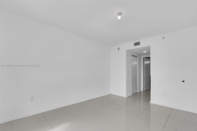 Live the urban lifestyle at 5252 Paseo! Bright and modern 1 on Doral Golf Resort in Florida - for sale on GolfHomes.com, golf home, golf lot