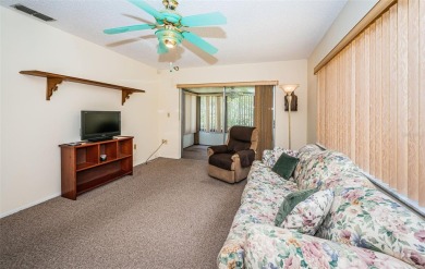 AFFORDABLE ~ 55+ MAINTENANCE FREE ~ TROPICAL SETTING ~ EXCELLENT on Gulf Harbors Golf Course in Florida - for sale on GolfHomes.com, golf home, golf lot