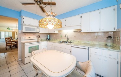 AFFORDABLE ~ 55+ MAINTENANCE FREE ~ TROPICAL SETTING ~ EXCELLENT on Gulf Harbors Golf Course in Florida - for sale on GolfHomes.com, golf home, golf lot