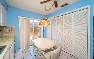 AFFORDABLE ~ 55+ MAINTENANCE FREE ~ TROPICAL SETTING ~ EXCELLENT on Gulf Harbors Golf Course in Florida - for sale on GolfHomes.com, golf home, golf lot