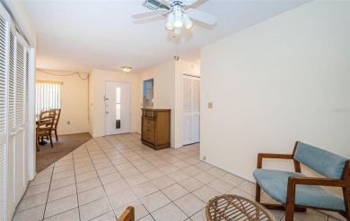 AFFORDABLE ~ 55+ MAINTENANCE FREE ~ TROPICAL SETTING ~ EXCELLENT on Gulf Harbors Golf Course in Florida - for sale on GolfHomes.com, golf home, golf lot