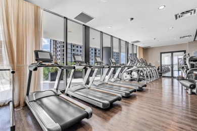Live the urban lifestyle at 5252 Paseo! Bright and modern 1 on Doral Golf Resort in Florida - for sale on GolfHomes.com, golf home, golf lot