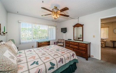 AFFORDABLE ~ 55+ MAINTENANCE FREE ~ TROPICAL SETTING ~ EXCELLENT on Gulf Harbors Golf Course in Florida - for sale on GolfHomes.com, golf home, golf lot
