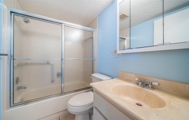 AFFORDABLE ~ 55+ MAINTENANCE FREE ~ TROPICAL SETTING ~ EXCELLENT on Gulf Harbors Golf Course in Florida - for sale on GolfHomes.com, golf home, golf lot