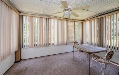 AFFORDABLE ~ 55+ MAINTENANCE FREE ~ TROPICAL SETTING ~ EXCELLENT on Gulf Harbors Golf Course in Florida - for sale on GolfHomes.com, golf home, golf lot