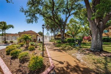 AFFORDABLE ~ 55+ MAINTENANCE FREE ~ TROPICAL SETTING ~ EXCELLENT on Gulf Harbors Golf Course in Florida - for sale on GolfHomes.com, golf home, golf lot