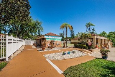AFFORDABLE ~ 55+ MAINTENANCE FREE ~ TROPICAL SETTING ~ EXCELLENT on Gulf Harbors Golf Course in Florida - for sale on GolfHomes.com, golf home, golf lot