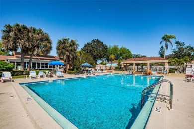 AFFORDABLE ~ 55+ MAINTENANCE FREE ~ TROPICAL SETTING ~ EXCELLENT on Gulf Harbors Golf Course in Florida - for sale on GolfHomes.com, golf home, golf lot