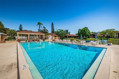 AFFORDABLE ~ 55+ MAINTENANCE FREE ~ TROPICAL SETTING ~ EXCELLENT on Gulf Harbors Golf Course in Florida - for sale on GolfHomes.com, golf home, golf lot