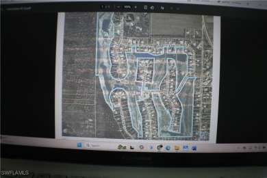 DIAMOND IN THE ROUGH! A GORDON G LEWIS DESIGNED 65 ACRE 18 HOLE on Alden Pines Golf Club in Florida - for sale on GolfHomes.com, golf home, golf lot